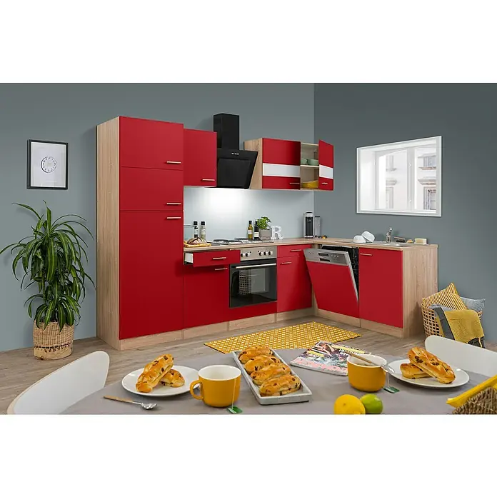 Respekta Winkelküche Merle - B x T: 280 x 172 cm, Rot, Mit Elektrogeräten, Volumen Backofen: 60 l - Modernes Kücheninterieur mit roten Schränken und Holzakzenten, einschließlich Elektrogeräten und Geschirr auf dem Tisch.