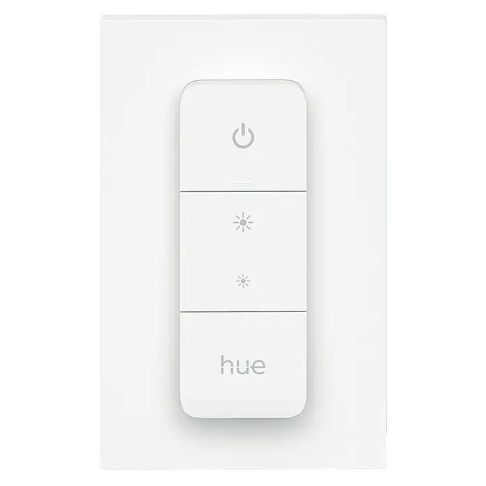 Philips Hue Dimmcontroller V2 - L x B x H: 1,5 x 8 x 12,5 cm - Nahaufnahme eines Philips Hue Smart Switch, mit Ein/Aus-Taste, Dimmfunktionen und Hue-Logo, montiert auf einer weißen Wandplatte.