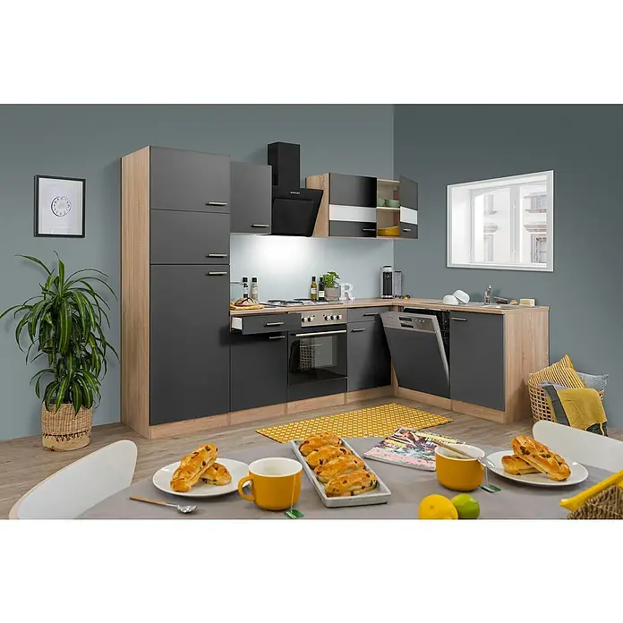 Respekta Winkelküche Merle - B x T: 280 x 172 cm, Grau, Mit Elektrogeräten, Volumen Backofen: 60 l - Modernes Küchendesign mit grauen Fronten, Holzoptik und Blick auf den Esstisch mit Gebäck und gelben Tassen. Stilvolle Einrichtung.