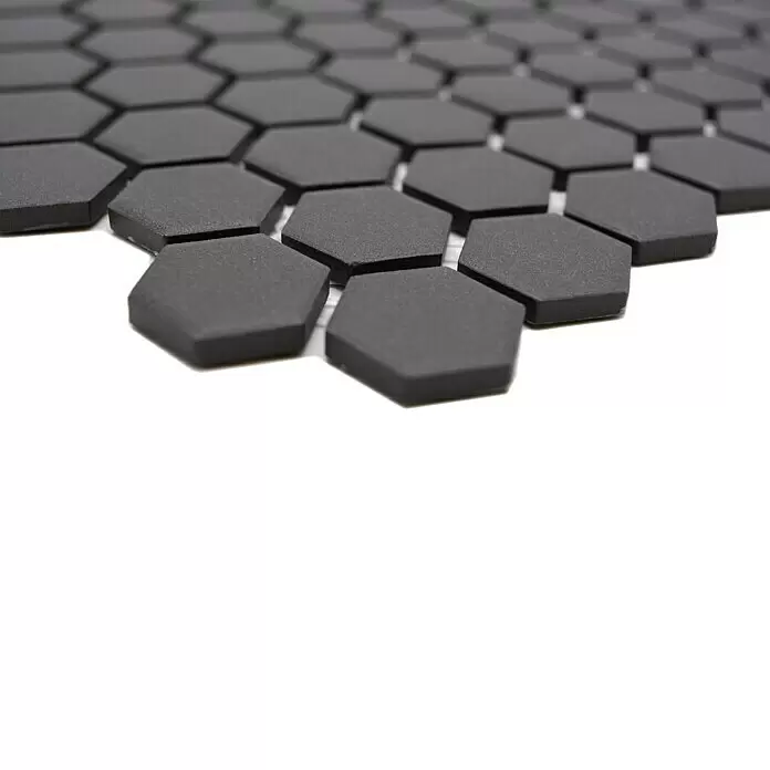 Mosaikfliese Hexagon Uni CU HX089 - 26 x 30 cm, Schwarz, Matt - Dunkelgraue sechseckige Mosaikfliesen mit matter, texturierter Oberfläche in einem sich wiederholenden Muster angeordnet.
